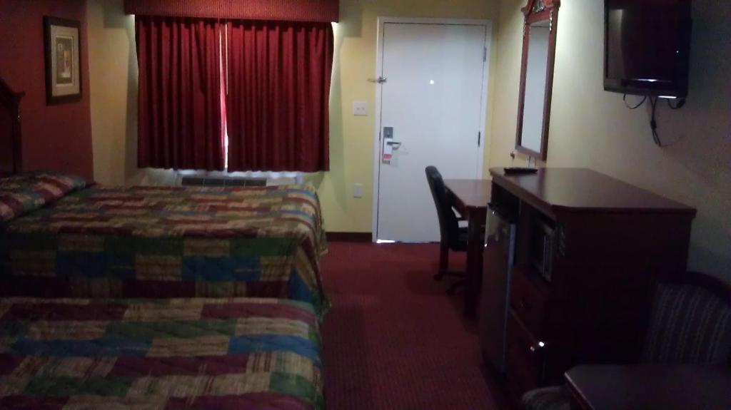 Scottish Inns Suites East Sam Houston Pkwy North 钱诺夫 客房 照片